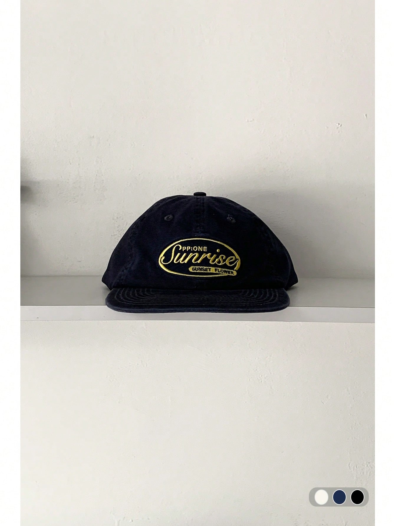 Sunrise Embroidery Flat Brim Skater Cap Navy Blue hats